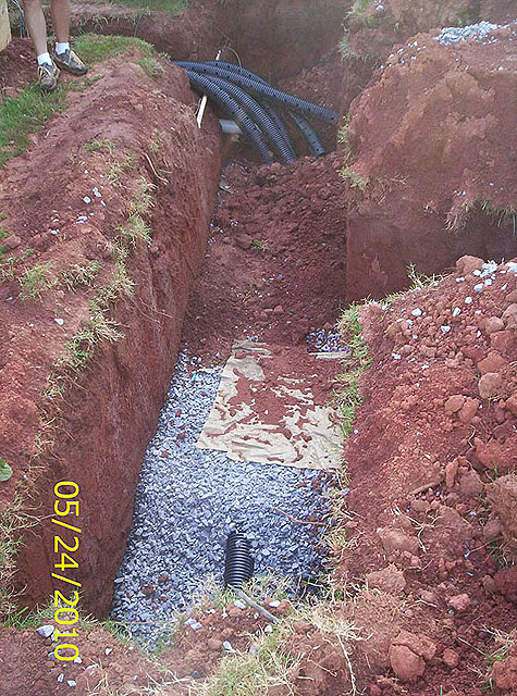 Overview of single drainfield trench Conventional Gravel System maintenance install repair company GSI is a your full service septic tank provider